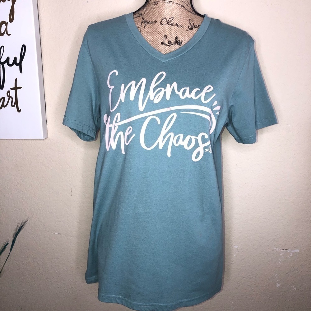Cheekys Blueish Color T shirt with “Embrace the Chaos” in Pink Size S